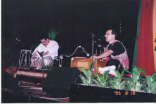 Dad performing with Farhad Darya.jpg